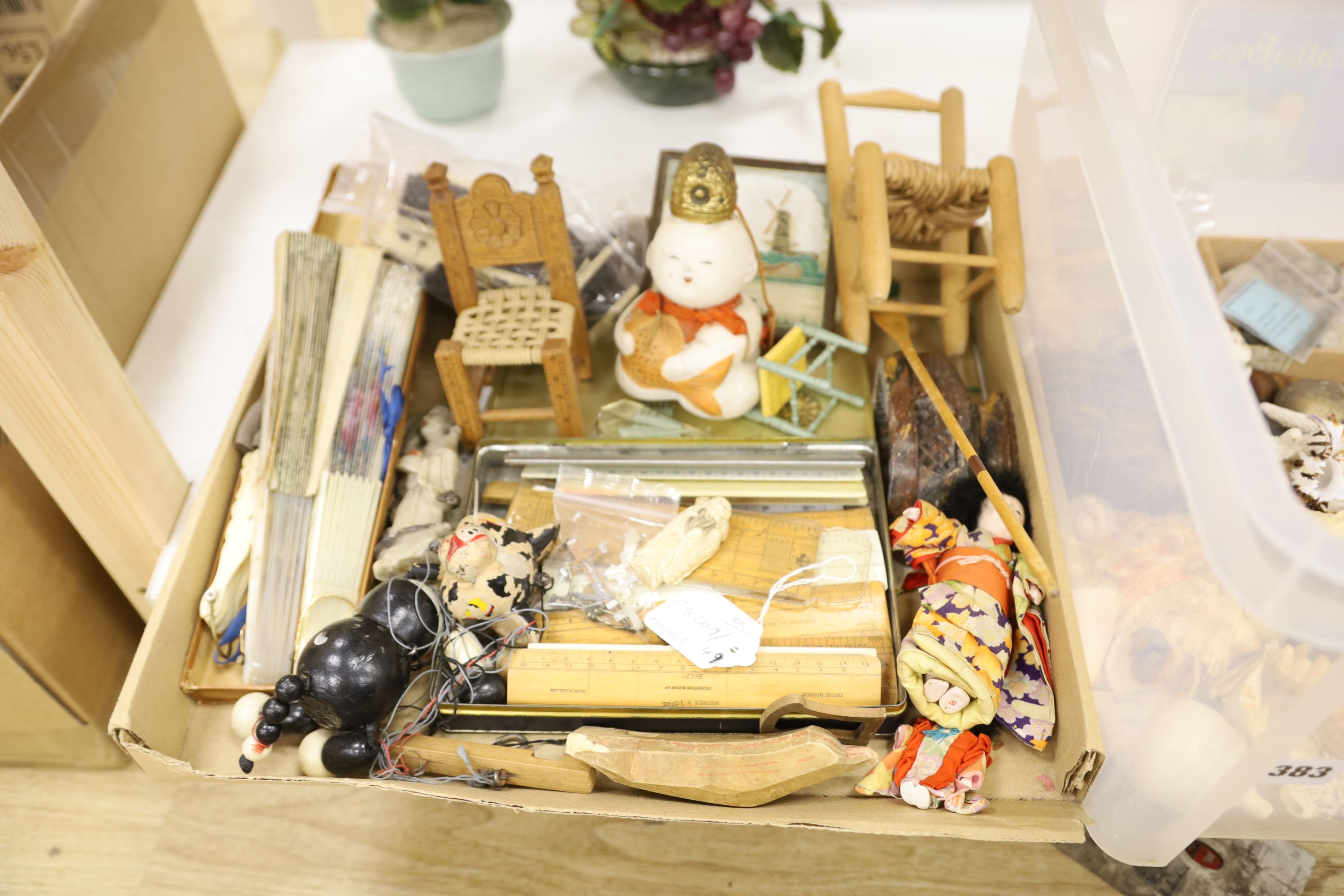 A collection of minerals, fossils and shells, together with a collection of rulers, fans and miscellaneous items